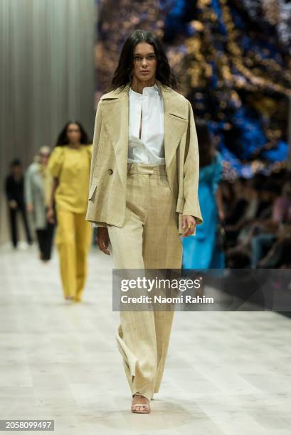 Model showcases designs by Martin Grant during the Triumphant x PayPal Runway at Melbourne Fashion Festival 2024 on March 04, 2024 in Melbourne,...