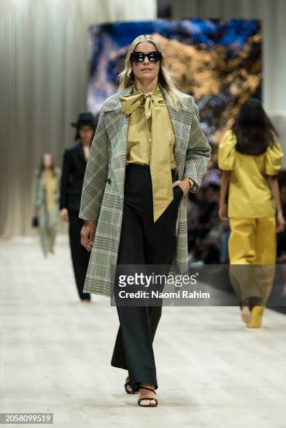 Model showcases designs by Martin Grant during the Triumphant x PayPal Runway at Melbourne Fashion Festival 2024 on March 04, 2024 in Melbourne,...