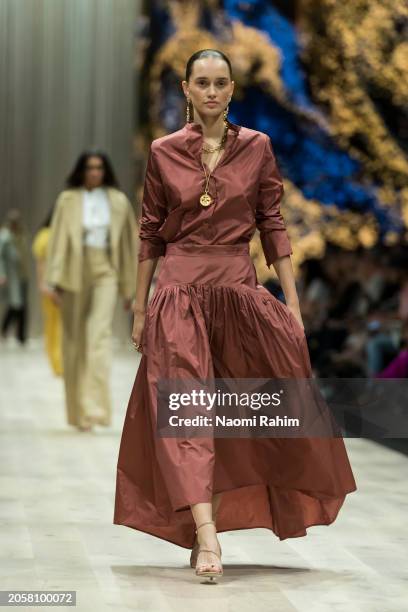 Model showcases designs by Martin Grant during the Triumphant x PayPal Runway at Melbourne Fashion Festival 2024 on March 04, 2024 in Melbourne,...