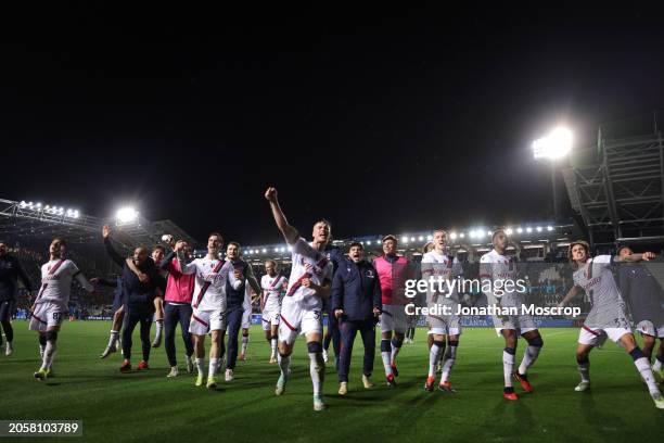 The Bologna FC team celebrates the 2-1 victory in front of fans following the final whistle of the Serie A TIM match between Atalanta BC and Bologna...