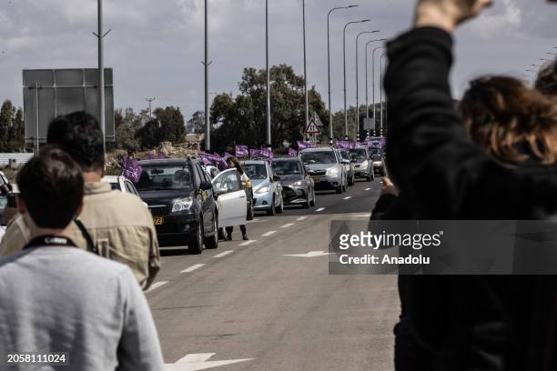 View of convoy of vehicles, organized by the non-governmental organization 'Standing Together,' established by Israeli and Arab activists, is seen as...