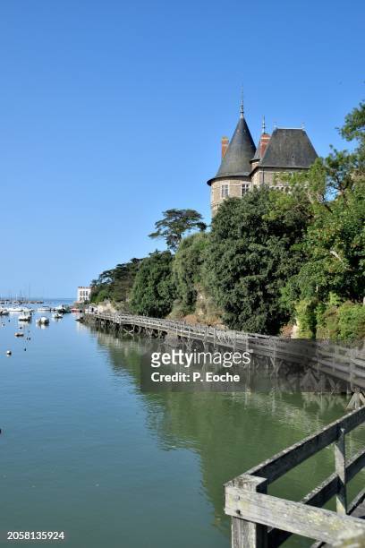pornic, the cove of rabbits, along the ramparts and tower of the castle - océan atlantique stockfoto's en -beelden
