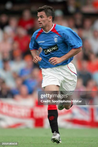 July 24: Nacho Novo of Glasgow Rangers running during the Pre Season Friendly match between Fulham and Glasgow Rangers at Craven Cottage on July 24,...