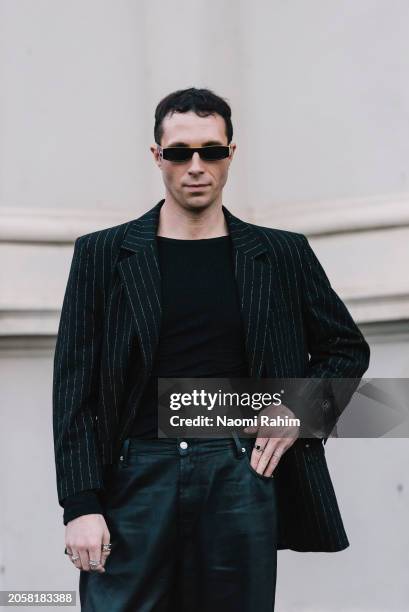 Off-duty model James Parr wears a Tommy Hilfiger womens pinstripe blazer at Melbourne Fashion Festival 2024 on March 04, 2024 in Melbourne, Australia.