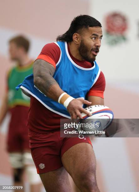 Manu Tuilagi takes part in an indoor training session at the Honda England Rugby Performance centre at Pennyhill Park on March 04, 2024 in Bagshot,...