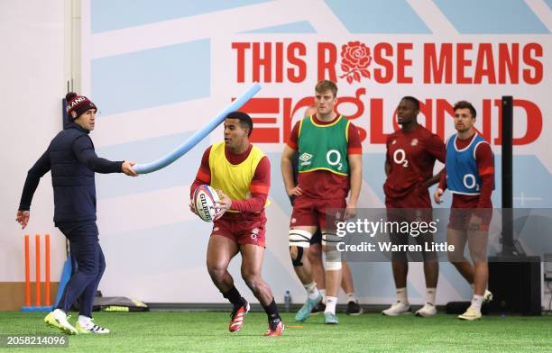 Immanuel Feyi-Waboso takes part in an indoor training session at the Honda England Rugby Performance centre at Pennyhill Park on March 04, 2024 in...