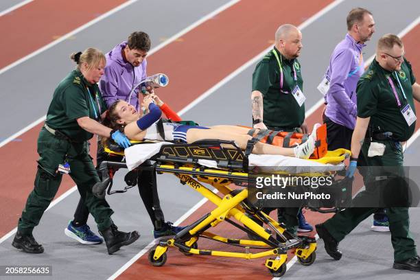 Margot Chevrier from France is being removed on a stretcher after suffering a horrific ankle injury during the 2024 World Athletics Championships at...