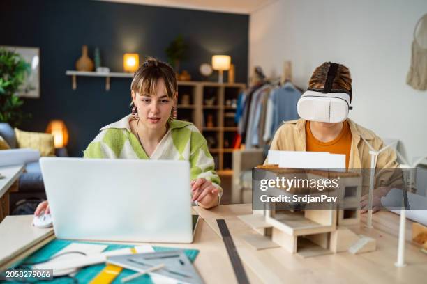 two female students studying in the common room of a university - virtual open house stock pictures, royalty-free photos & images