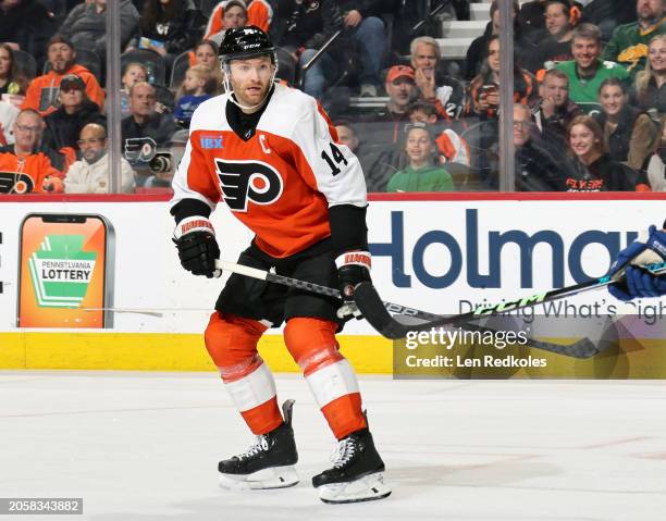 Sean Couturier of the Philadelphia Flyers skates against the Tampa Bay Lightning at the Wells Fargo Center on February 27, 2024 in Philadelphia,...