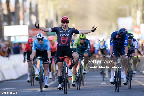 Arvid De Kleijn of The Netherlands and Tudor Pro Cycling Team celebrates at finish line as stage winner ahead of Laurence Pithie of New Zealand and...