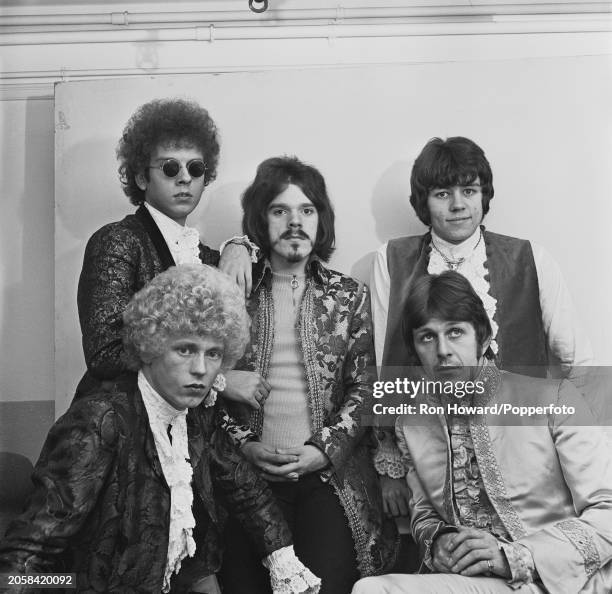 English rock and pop group The Move posed backstage in London circa October 1967. Members of the group are, clockwise from top left, guitarist Trevor...