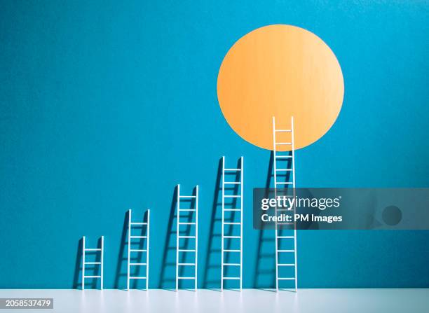 only 1 of 5 ladders reach in ascending order - längtan bildbanksfoton och bilder
