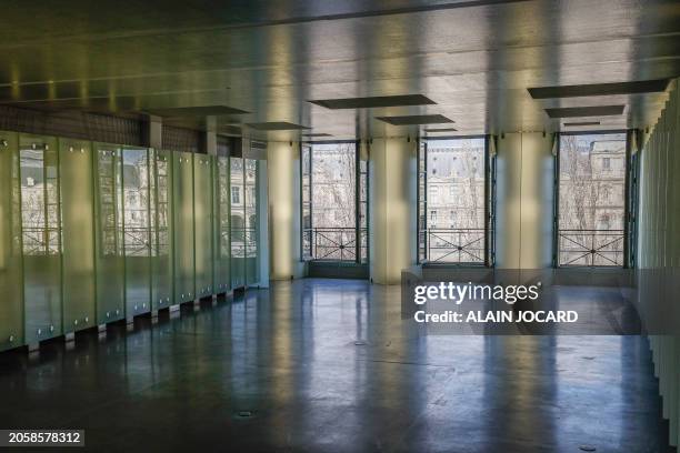 Photograph taken in Paris on March 7 shows part of the living room - with a view on the Louvre museum - of the futuristic 260 m2 three-room apartment...