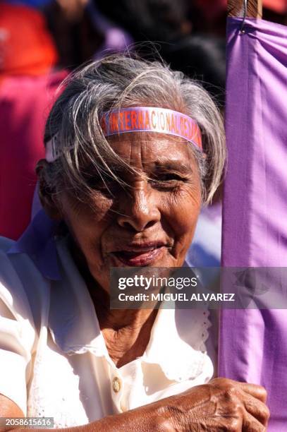 Woman takes part of the women protest against Sandinista candidate Daniel Ortega, on the International Women Day, 08 March 2001, in Managua,...