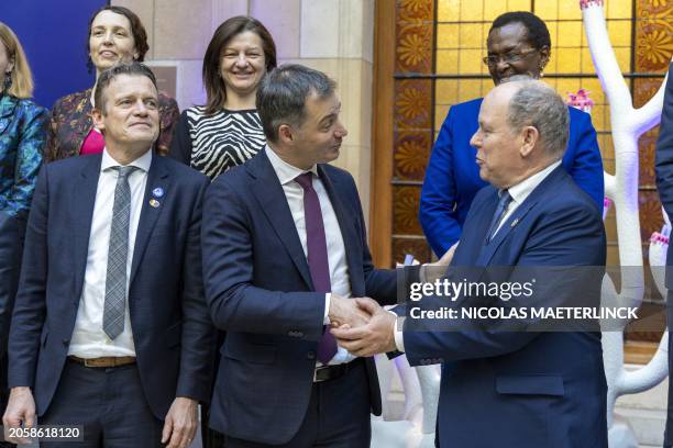 Minister of Justice Paul Van Tigchelt, Prime Minister Alexander De Croo and Prince Albert of Monaco pictured during the Blue Leaders event, organized...