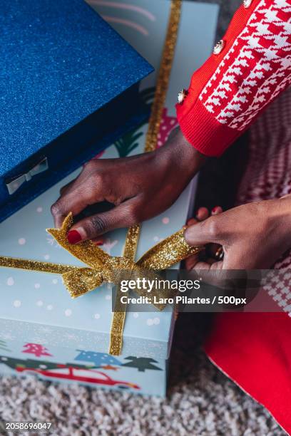 cropped hands of woman holding gift box,corpus christi,texas,united states,usa - corpus christi stock pictures, royalty-free photos & images