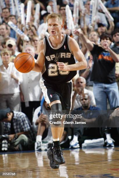 Steve Kerr of the San Antonio Spurs dribbles against the Dallas Mavericks in Game six of the Western Conference Finals during the 2003 NBA Playoffs...