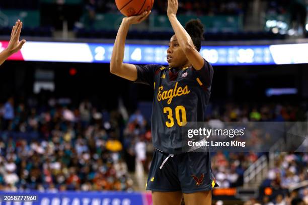 Yana Todd of the Boston College Eagles puts up a three-point shot during the first half of the game against the Louisville Cardinals in the Second...