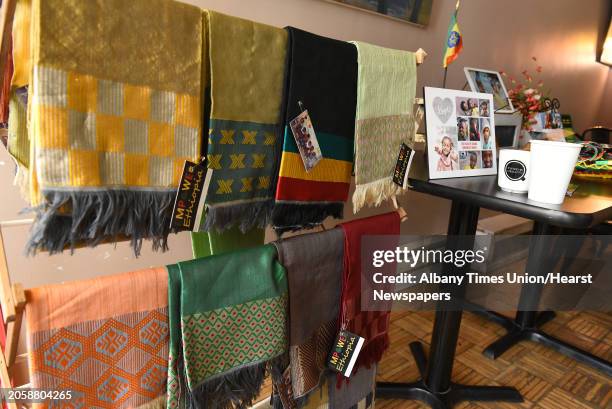 Merchandise for sale at Happy Cappuccino where Belayneh Woldemariam of Ethiopia was sampling various coffees as Empower Ethiopian hosted a...