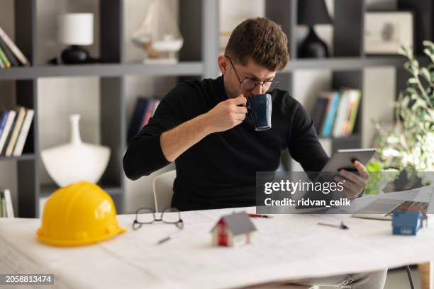 architect work on digital tablet - autocad stock pictures, royalty-free photos & images
