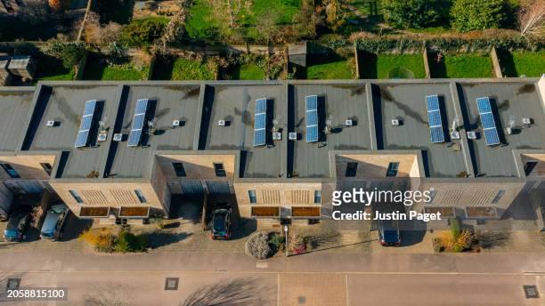 drone/aerial view of modern terraced housing in cambridge, uk - cambridge uk aerial stock pictures, royalty-free photos & images