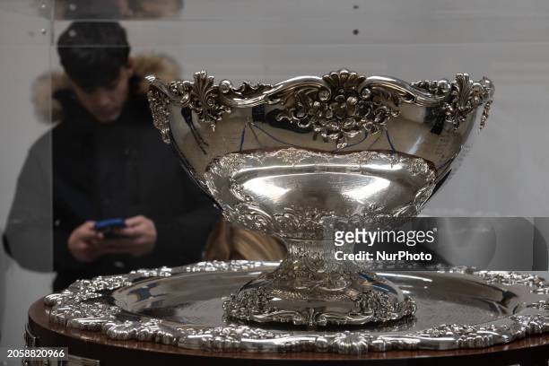 Boy taking a photo to Davis Cup trophy is seen during Italian Trophy Tour in L'Aquila, Italy, on March 1st, 2024. Italy won 2023 Davis Cup against...