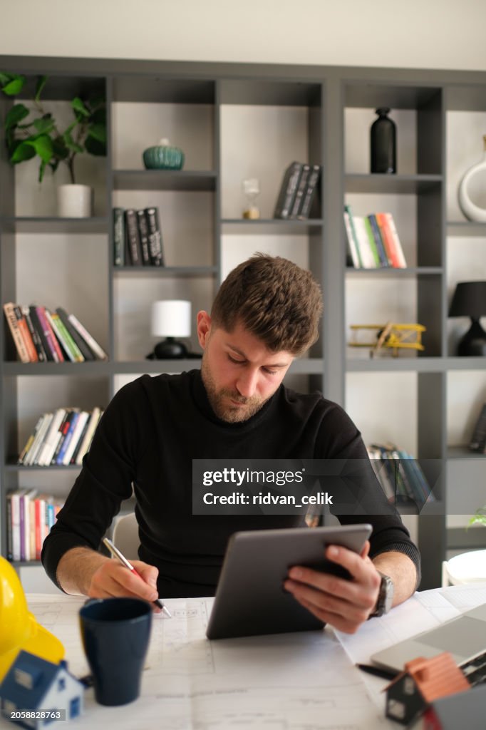Architect work on digital tablet