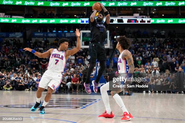 Kyrie Irving of the Dallas Mavericks shoots during the second half against the Philadelphia 76ers at American Airlines Center on March 03, 2024 in...