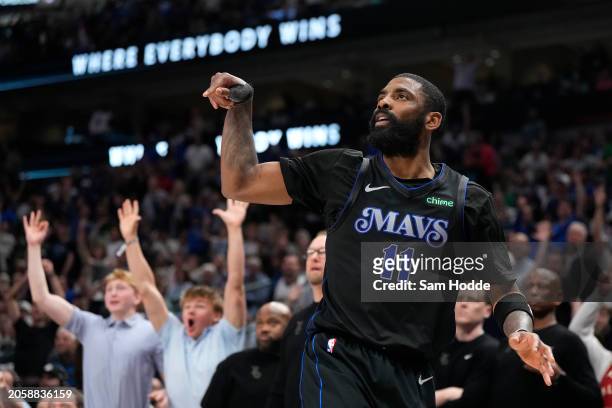 Kyrie Irving of the Dallas Mavericks watches his shot during the second half against the Philadelphia 76ers at American Airlines Center on March 03,...