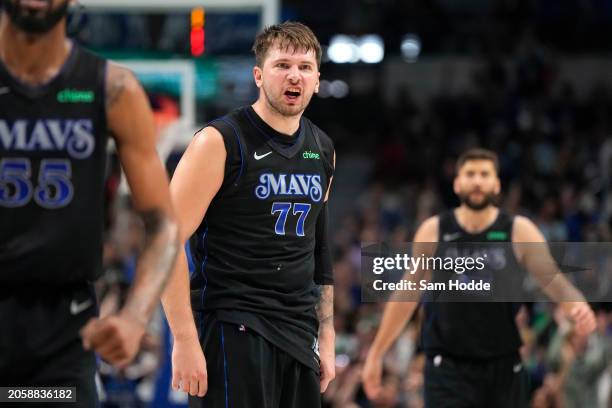 Luka Doncic of the Dallas Mavericks looks on during the second half against the Philadelphia 76ers at American Airlines Center on March 03, 2024 in...