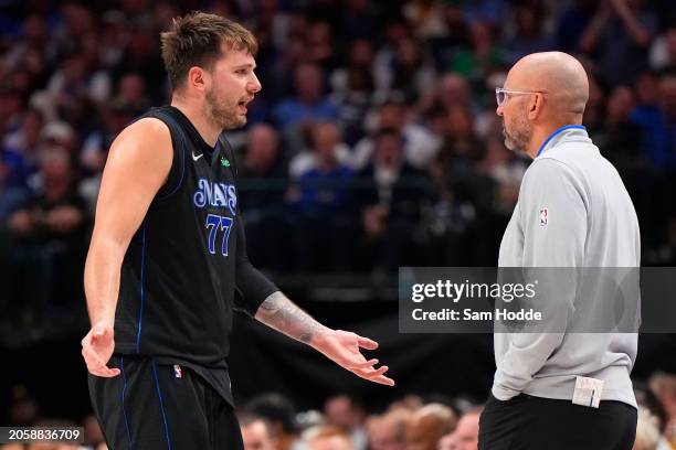 Luka Doncic of the Dallas Mavericks talks to head coach Jason Kidd during the second half against the Philadelphia 76ers at American Airlines Center...