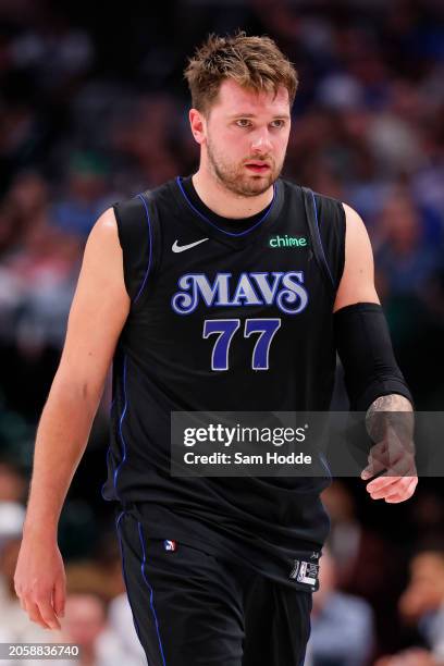 Luka Doncic of the Dallas Mavericks looks on during the second half against the Philadelphia 76ers at American Airlines Center on March 03, 2024 in...