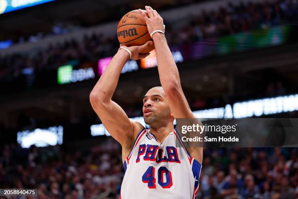 Nicolas Batum of the Philadelphia 76ers shoots during the first half against the Dallas Mavericks at American Airlines Center on March 03, 2024 in...
