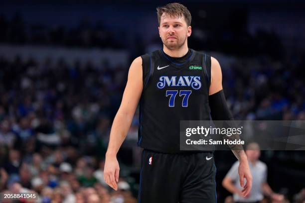 Luka Doncic of the Dallas Mavericks looks on during the first half against the Philadelphia 76ers at American Airlines Center on March 03, 2024 in...