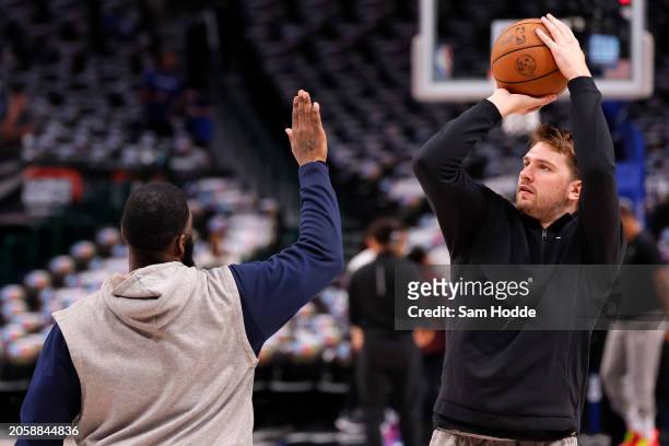 Luka Doncic of the Dallas Mavericks warms up before the game against the Philadelphia 76ers at American Airlines Center on March 03, 2024 in Dallas,...