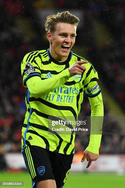 Martin Odegaard of Arsenal celebrates after scoring his team's first goal during the Premier League match between Sheffield United and Arsenal FC at...