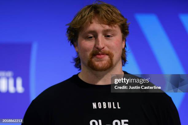 Karsen Barnhart #OL05 of the Michigan speaks to the media during the 2024 NFL Combine at the Indiana Convention Center on March 02, 2024 in...