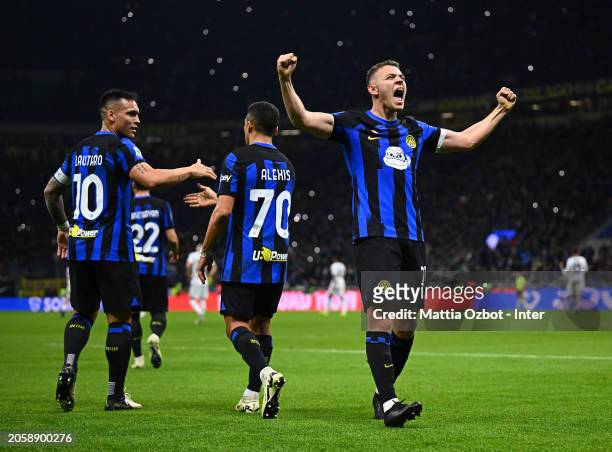 Kristjan Asllani of FC Internazionale celebrates after scoring his team's first goal during the Serie A TIM match between FC Internazionale and Genoa...