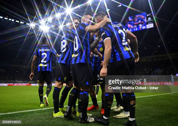 Kristjan Asllani of FC Internazionale celebrates with teammates after scoring his team's first goal during the Serie A TIM match between FC...