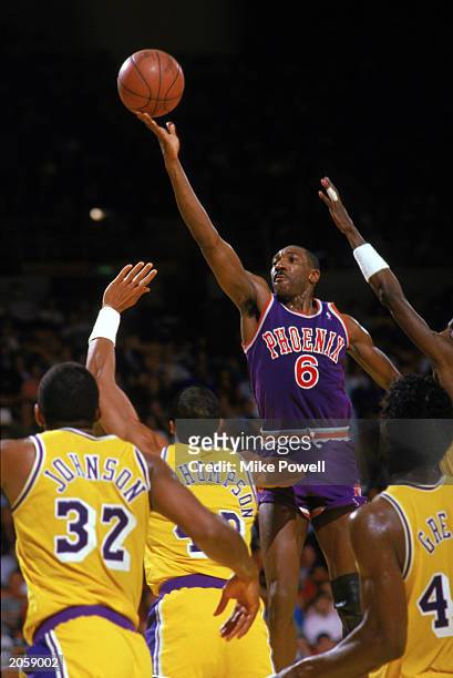 Walter Davis of the Phoenix Suns shoots against the Los Angeles Lakers during the game at the Great Western Forum in Inglewood, California.