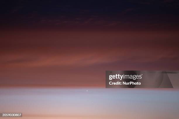 Venus and Mars planets in conjunction before sunrise are seen from L'Aquila, Italy, on February 22nd, 2024. Venus, the brilliant &quot;Morning...