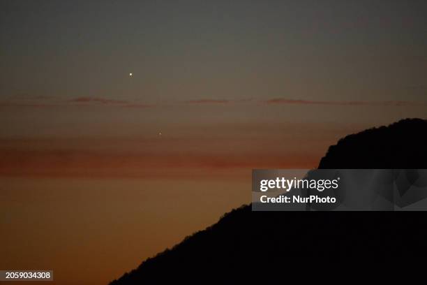 Venus and Mars planets in conjunction before sunrise are seen from L'Aquila, Italy, on February 22nd, 2024. Venus, the brilliant &quot;Morning...