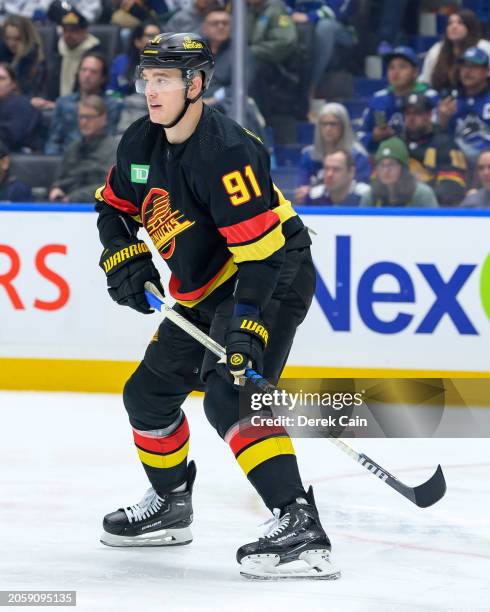 Nikita Zadorov of the Vancouver Canucks skates up ice during the third period of the NHL game against the Los Angeles Kings at Rogers Arena on...