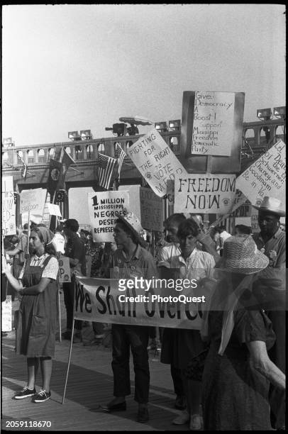 View of demonstrators, many holding signs in support of the Mississippi Freedom Democratic Party , outside Boardwalk Hall during the 1964 Democratic...
