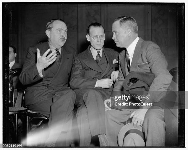 View of, from left, Farnsworth Television and Radio Corporation secretary George Everson, company founder & inventor Philo T Farnsworth , and US...