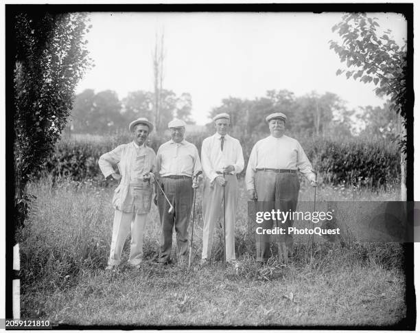 Portrait of, from left, amateur golfer Walter Travis , US Vice President James S Sherman, amateur golfer Allan Lard , US President William Howard...