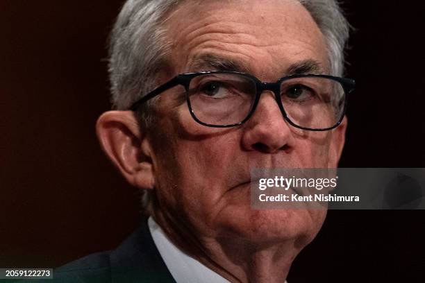 Federal Reserve Bank Chairman Jerome Powell prepares to testify before the Senate Banking, Housing and Urban Affairs Committee on Capitol Hillon...