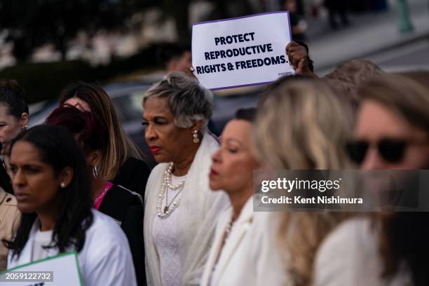 Members of congress and their guests listen a news conference held by members of the Pro-Choice Caucus and Democratic Women's Caucus at the U.S....