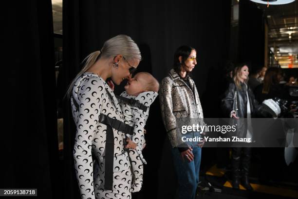 Model poses backstage prior to the Marine Serre Womenswear Fall/Winter 2024-2025 show as part of Paris Fashion Week on March 04, 2024 in Paris,...