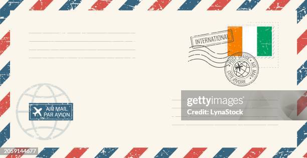 blank air mail grunge envelope with cote d'ivoire postage stamp. vintage postcard vector illustration with ivorian national flag isolated on white background. retro style. - post office stock illustrations
